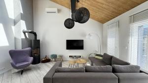 Posedenie v ubytovaní Apartament Sun House SAUNA KOMINEK SKRZYCZNE