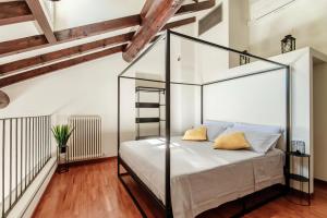 Voodi või voodid majutusasutuse Ortensia Apartment - House Of Travelers toas