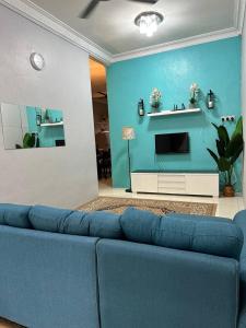 Χώρος καθιστικού στο Pa&Ma HomeStay Kulim III 3R2B FullyAircond