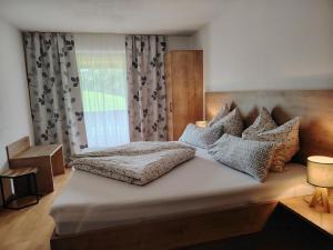 Posteľ alebo postele v izbe v ubytovaní Bio-Bauernhof "Hecherhof"