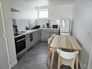 Η κουζίνα ή μικρή κουζίνα στο Appartement 1 à la ferme