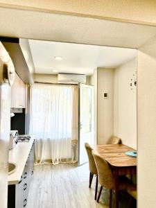 TV a/nebo společenská místnost v ubytování Two bedrooms apartment "Kitesa"