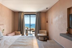 Postel nebo postele na pokoji v ubytování Tetra Resort & Spa Kefalonia