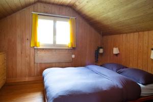 Unique Tiny house between Mnt Rigi and Lake Lucerne客房内的一张或多张床位