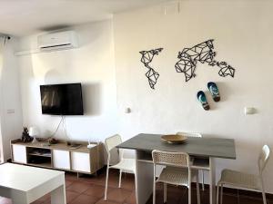 TV a/nebo společenská místnost v ubytování Terrazza sul blu