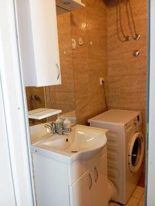 Koupelna v ubytování Apartment Deki studio