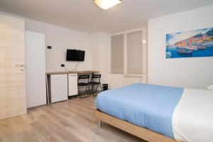 Postel nebo postele na pokoji v ubytování gabry acquarium rooms