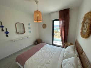 Ένα ή περισσότερα κρεβάτια σε δωμάτιο στο Ayla Beach Apartment Azure 1522 Families only