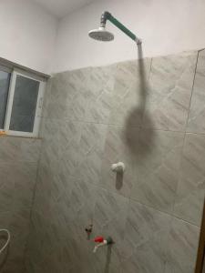 Ένα μπάνιο στο Cozy Apartment in Silicon Yaba