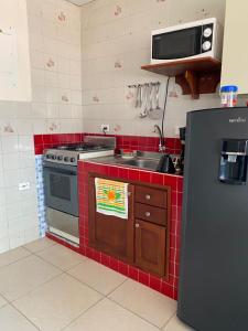 Kuchyň nebo kuchyňský kout v ubytování Casa 1090 ubicada cerca a todo. + 9 fotografií