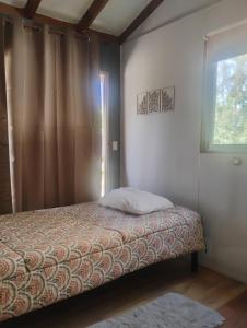Postel nebo postele na pokoji v ubytování Cabaña Mirador