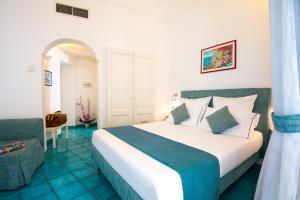 Ένα ή περισσότερα κρεβάτια σε δωμάτιο στο Residenza Pansa B&B