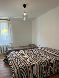 Posteľ alebo postele v izbe v ubytovaní Residence Dromaè