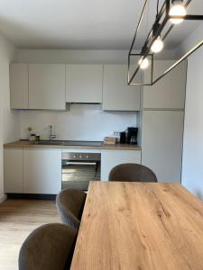 Kuchyňa alebo kuchynka v ubytovaní Residence Dromaè