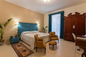Postel nebo postele na pokoji v ubytování Hotel Parco delle Fontane + 37 fotografií