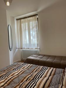 Posteľ alebo postele v izbe v ubytovaní Residence Dromaè