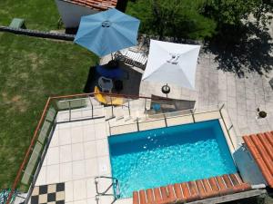 Bazén v ubytování Retiro na Natureza - Casa com piscina nebo v jeho okolí + 19 fotografií
