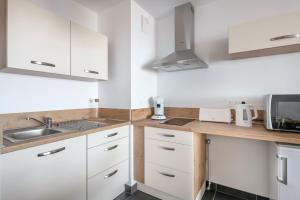 Η κουζίνα ή μικρή κουζίνα στο Bel appartement pour 4 face mer