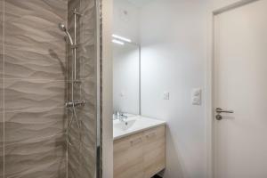 Ένα μπάνιο στο Bel appartement pour 4 face mer