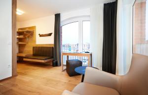 Posezení v ubytování Im-Jaich Hotel Bremerhaven