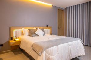 Fotografie z fotogalerie ubytování Charming Stadio Retreat Rosa Negra Aparta-Suite v destinaci Medellín