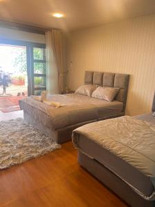 Ένα ή περισσότερα κρεβάτια σε δωμάτιο στο Ban slow life Koh Libong