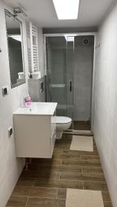 Kúpeľňa v ubytovaní Dwunastka