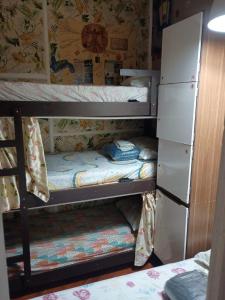 Hostel Trilhas e Rotas - a 150m da Avenida Paulista客房内的一张或多张床位