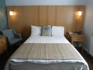 Postel nebo postele na pokoji v ubytování Park Hotel