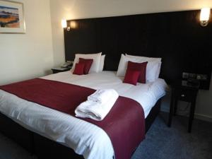 Postel nebo postele na pokoji v ubytování Park Hotel