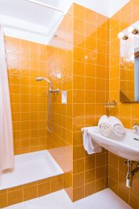 Łazienka w obiekcie Apartmenthaus Kuchelberg