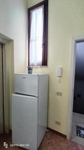 Kuchyňa alebo kuchynka v ubytovaní Casa Vacanze Vita 1