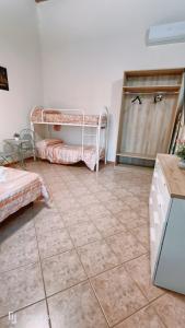Posteľ alebo postele v izbe v ubytovaní Casa Vacanze Vita 1