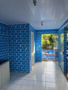 Bazén v ubytování Casa próximo parque de eventos com piscina aquecida na temporada nebo v jeho okolí