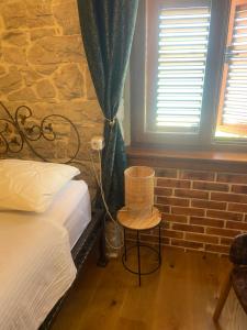 Postel nebo postele na pokoji v ubytování Obala apartman
