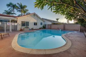 a swimming pool in the backyard of a house at F-24 Mickeys House in Anaheim