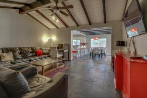 a living room with a couch and a table at F-24 Mickeys House in Anaheim