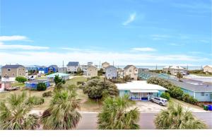 a view of a town with houses and palm trees at Ocean View Condo in Surf City - Sea Coast Suites 25 in Surf City