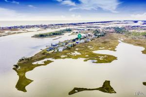 an aerial view of an island in the water at Dog Friendly | Waterfront | Surf City, NC | 2 Master Suites | Elevator in Surf City