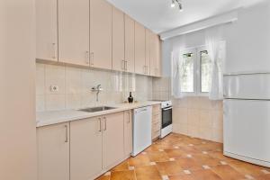 Kuchyň nebo kuchyňský kout v ubytování Apartments Dončić
