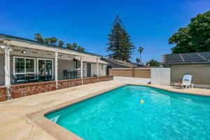 a swimming pool in the backyard of a house at F-66 Poolside Retreat in Anaheim