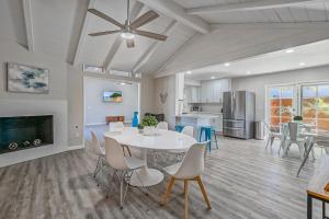 a dining room and kitchen with a table and chairs at F-65 Adventure House in Anaheim
