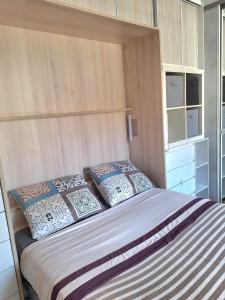 Кровать или кровати в номере Studio " La Plage " avec parking privé gratuit et CLIM