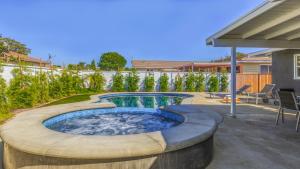 a hot tub in the middle of a patio at F-53 Trenton in Anaheim