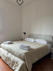 Letto o letti in una camera di Atomos