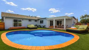 a swimming pool in the yard of a house at F-52 Trenton II in Anaheim