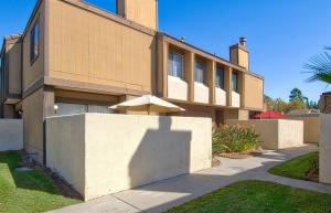 a building with an umbrella on the side of it at New Suite Escapes 5 by Funtierland Vacation Rentals in Anaheim
