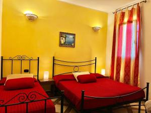 Postel nebo postele na pokoji v ubytování Agriturismo Molle