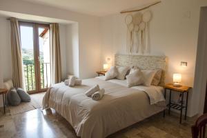 Postel nebo postele na pokoji v ubytování O' Stiavucco B&B