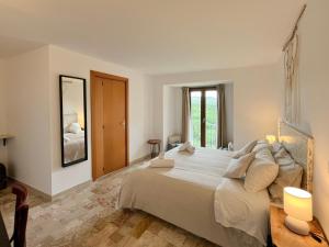 Postel nebo postele na pokoji v ubytování O' Stiavucco B&B